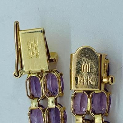 LOT 56: - 11.66g tw 14K ODI Yellow Gold 7" Amethyst Bracelet - Double Row