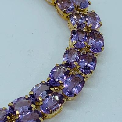 LOT 56: - 11.66g tw 14K ODI Yellow Gold 7" Amethyst Bracelet - Double Row