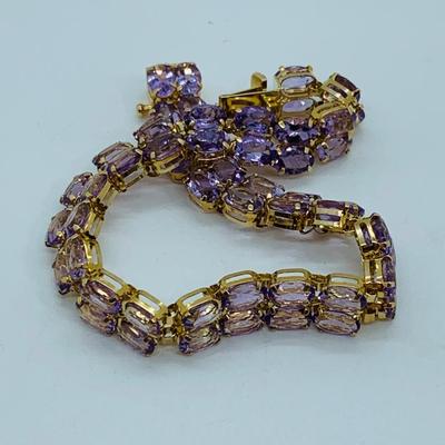 LOT 56: - 11.66g tw 14K ODI Yellow Gold 7" Amethyst Bracelet - Double Row