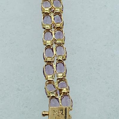 LOT 56: - 11.66g tw 14K ODI Yellow Gold 7" Amethyst Bracelet - Double Row