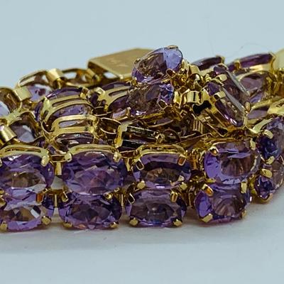 LOT 56: - 11.66g tw 14K ODI Yellow Gold 7" Amethyst Bracelet - Double Row