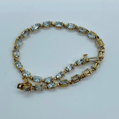 LOT 70: Aquamarine & 14K Gold 7" Tennis Bracelet - 6.81 gtw