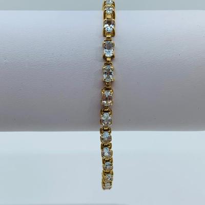 LOT 70: Aquamarine & 14K Gold 7" Tennis Bracelet - 6.81 gtw
