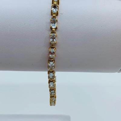 LOT 70: Aquamarine & 14K Gold 7" Tennis Bracelet - 6.81 gtw