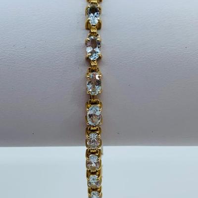 LOT 70: Aquamarine & 14K Gold 7" Tennis Bracelet - 6.81 gtw