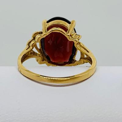 LOT 92: Oval Garnet  14K Gold Size 7 Ring - 3.54 gtw