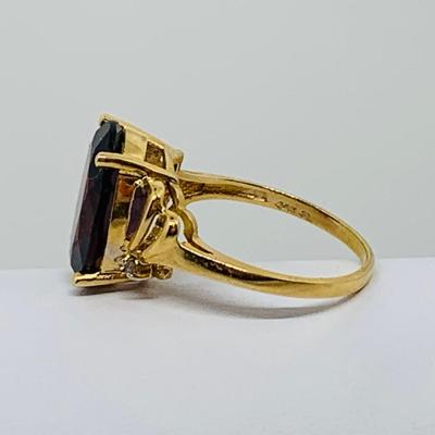 LOT 92: Oval Garnet  14K Gold Size 7 Ring - 3.54 gtw