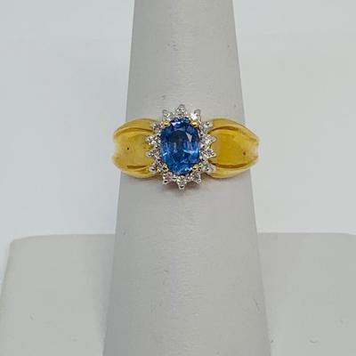 LOT 108: 14K Gold Tanzanite w/ Diamond Halo Size 7.5 Ring - 3.5 gtw