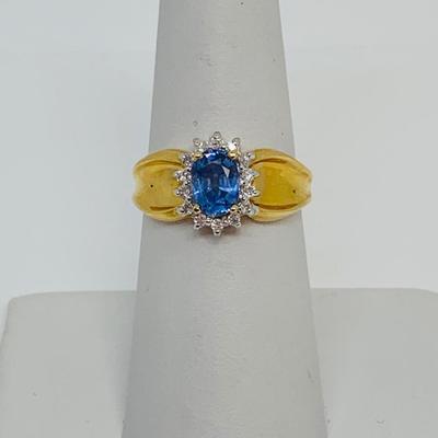 LOT 108: 14K Gold Tanzanite w/ Diamond Halo Size 7.5 Ring - 3.5 gtw