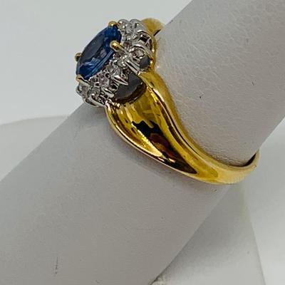 LOT 108: 14K Gold Tanzanite w/ Diamond Halo Size 7.5 Ring - 3.5 gtw