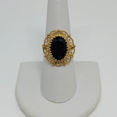 LOT 110: Garnet 10K Gold Size 8 Ring - 5.55 gtw