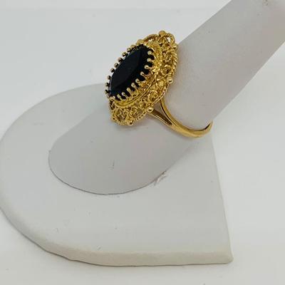 LOT 110: Garnet 10K Gold Size 8 Ring - 5.55 gtw