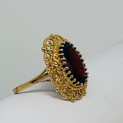 LOT 110: Garnet 10K Gold Size 8 Ring - 5.55 gtw