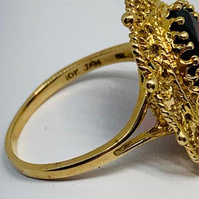 LOT 110: Garnet 10K Gold Size 8 Ring - 5.55 gtw