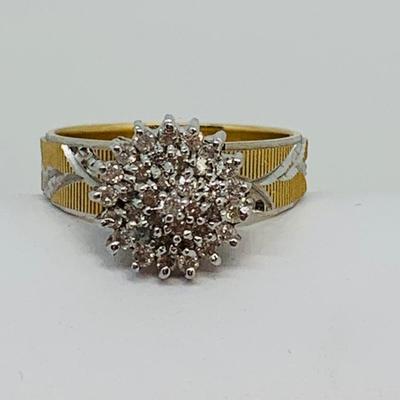 LOT 115: - 4.23g tw 10K EV 21 Diamond Cluster Ring -  two tone band - Size 7