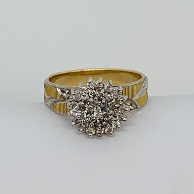 LOT 115: - 4.23g tw 10K EV 21 Diamond Cluster Ring -  two tone band - Size 7