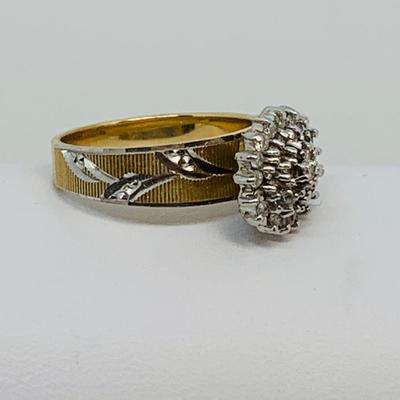 LOT 115: - 4.23g tw 10K EV 21 Diamond Cluster Ring -  two tone band - Size 7