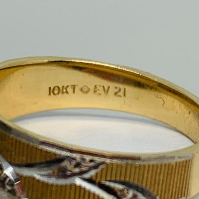 LOT 115: - 4.23g tw 10K EV 21 Diamond Cluster Ring -  two tone band - Size 7