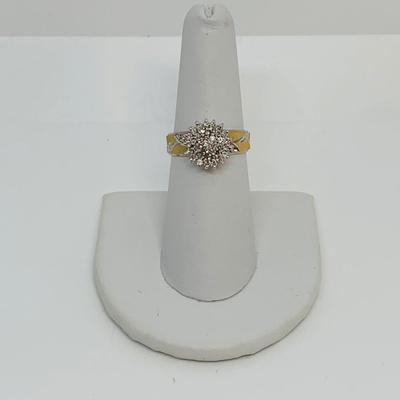 LOT 115: - 4.23g tw 10K EV 21 Diamond Cluster Ring -  two tone band - Size 7