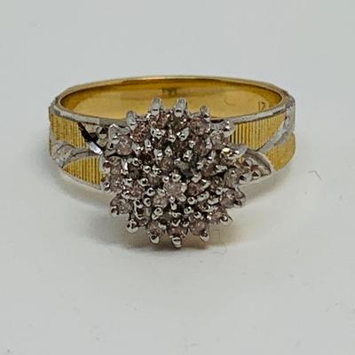 LOT 115: - 4.23g tw 10K EV 21 Diamond Cluster Ring -  two tone band - Size 7