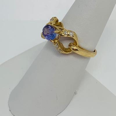 LOT 124: Tanzanite and Diamonds 14K Gold Ring - Size 7.5 - 3.94 gtw