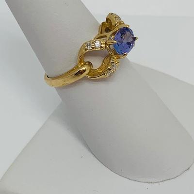 LOT 124: Tanzanite and Diamonds 14K Gold Ring - Size 7.5 - 3.94 gtw