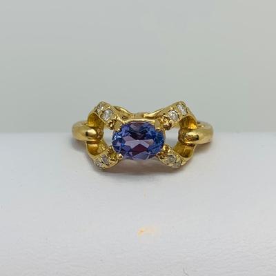 LOT 124: Tanzanite and Diamonds 14K Gold Ring - Size 7.5 - 3.94 gtw