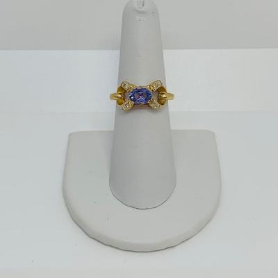 LOT 124: Tanzanite and Diamonds 14K Gold Ring - Size 7.5 - 3.94 gtw