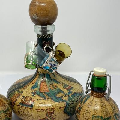 Vintage Old World Map Decanter with Stopper, Two Small Decanters, and Three Shot Glasses