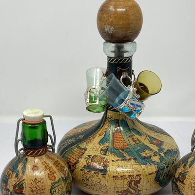 Vintage Old World Map Decanter with Stopper, Two Small Decanters, and Three Shot Glasses