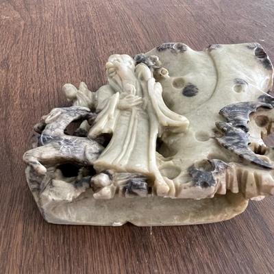 Asian stone carving - tending to the flock