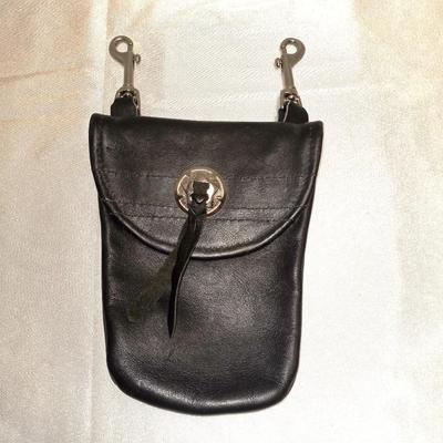 PAIR OF SPURS AND WOLFTRAX LEATHER POUCH