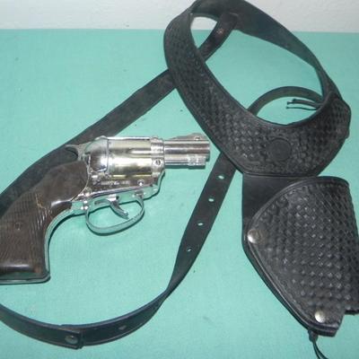TWO VINTAGE CAPGUNS IN HOLSTERS