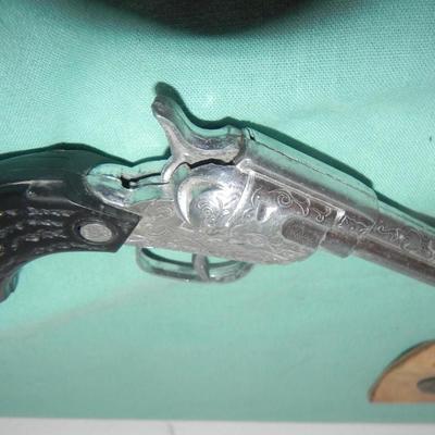TWO VINTAGE CAPGUNS IN HOLSTERS