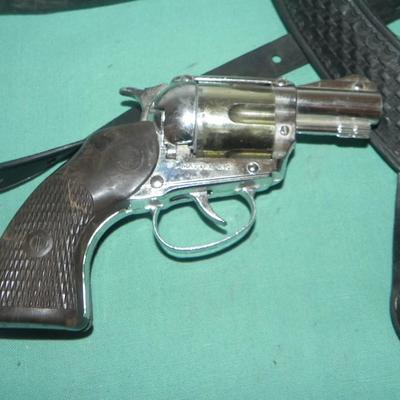 TWO VINTAGE CAPGUNS IN HOLSTERS