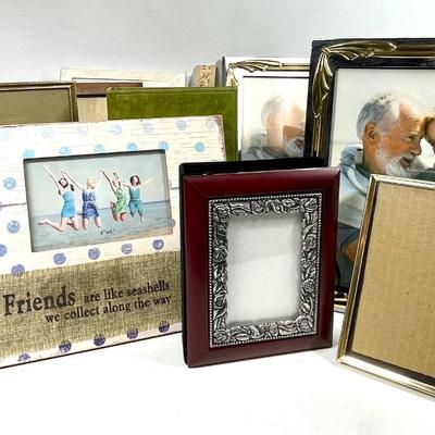 Lot of picture frames and photo books various sizes