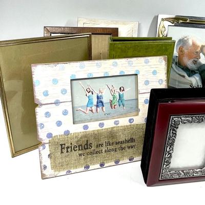 Lot of picture frames and photo books various sizes