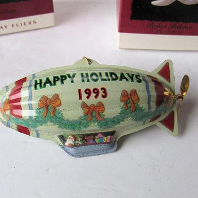 2 Hallmark Christmas Ornaments: Tin Blimp, 1993 and Perfect Balance, 1995