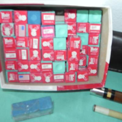 THREE PROFFESIONAL POOL CUES AND BOX OF CHAULK CUE CUBES