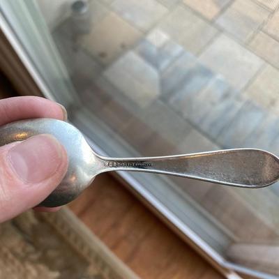 1 - Sterling silver baby food pusher and 1 Sterling baby spoon engraved with "Susan" 