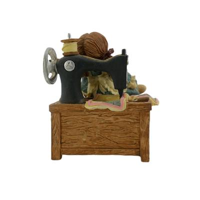 Vintage Doll and Sewing Machine Musical Figurine