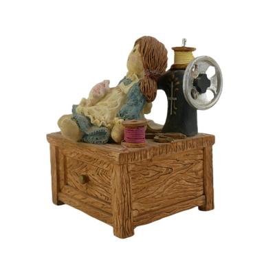Vintage Doll and Sewing Machine Musical Figurine