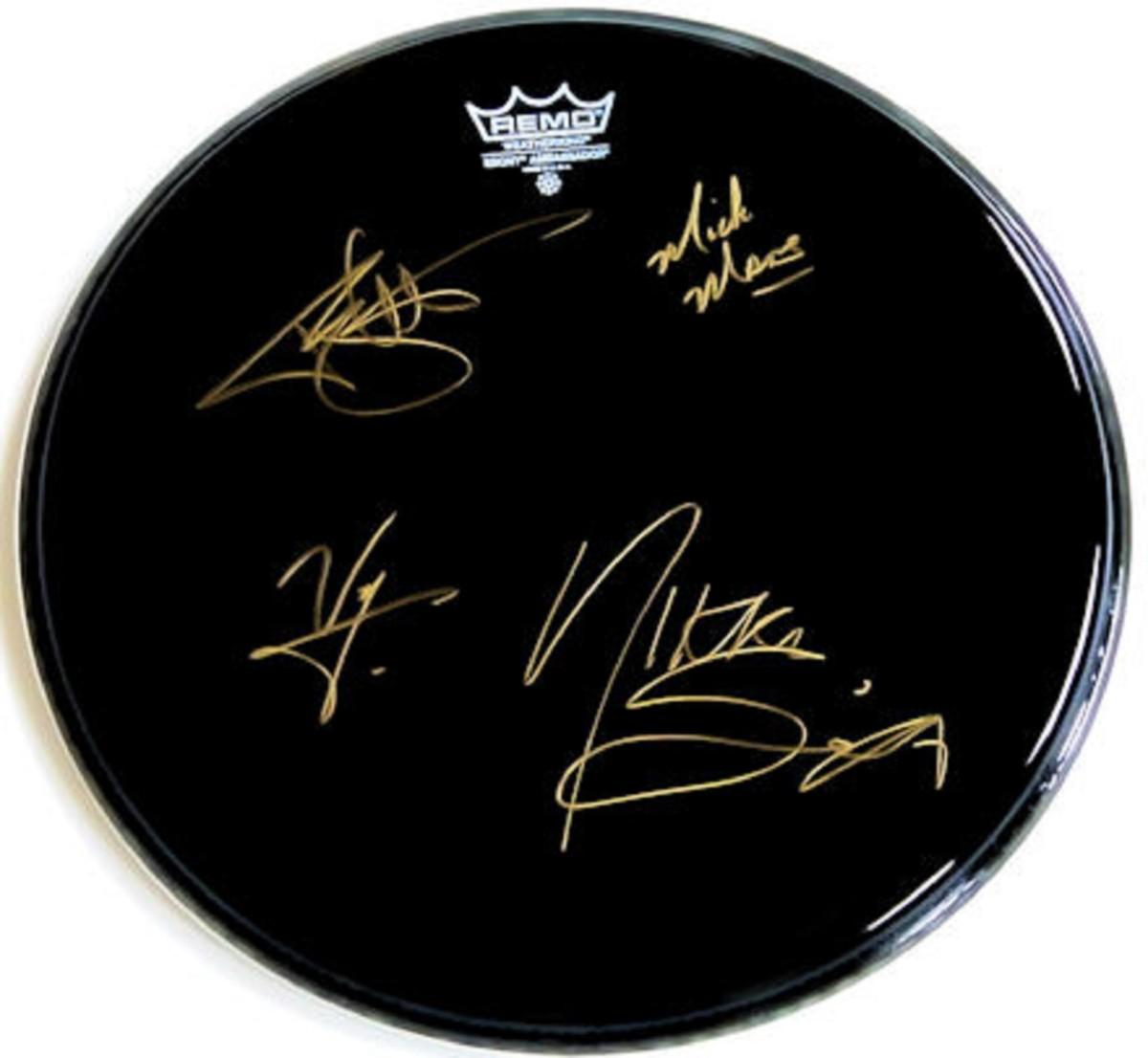 MÃ¶tley CrÃ¼e signed drum head | EstateSales.org
