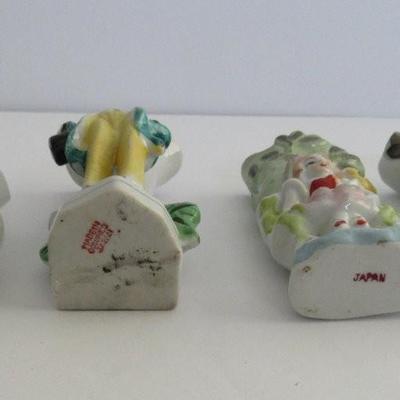 2 Occupied Japan figural Vases and 2 Japan Figural Vases, Small