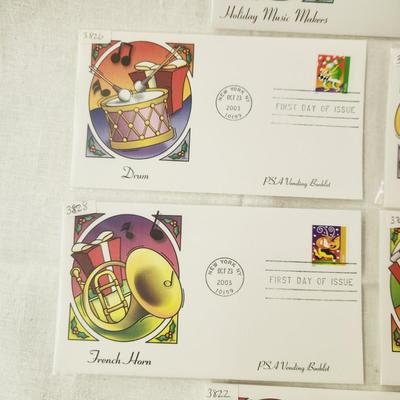 6 - FIRST DAY STAMPS - 2003 HOLIDAY MUSIC MAKERS / PSA VENDING BOOKLET