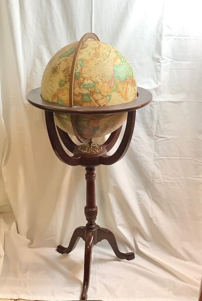 Lot 422. Replogle 16” Globe on Mahogany/Brass Stand | EstateSales.org