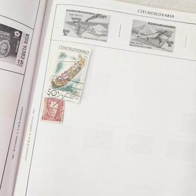 POSTAGE STAMP ALBUM - WITH STAMPS