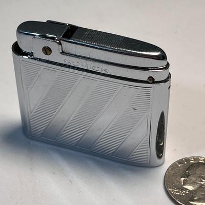SHINY CHROME â€œSCHICKâ€ CIGARETTE LIGHTER