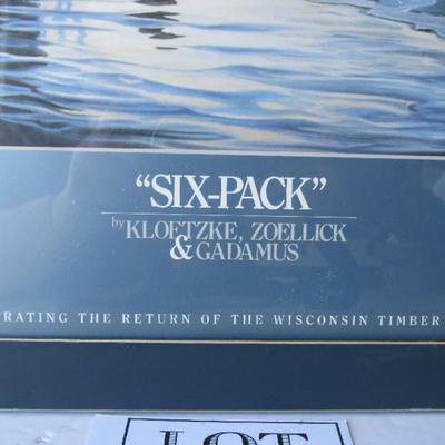 Lot 368: Large Picture: "Six-Pack" Celebrate the Timber Wolf, Artist Zoellick Signed in Silver Pen, 20" x 26"