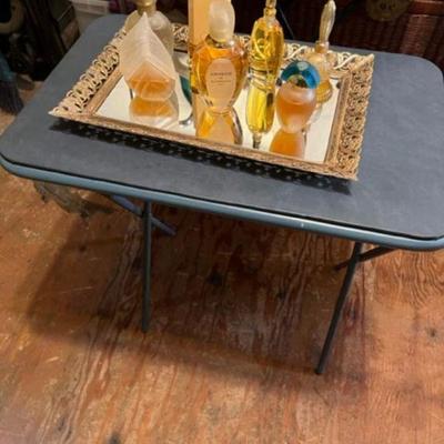 Name brand fragrances
Some Sold More Added

and gilded vanity mirrored tray